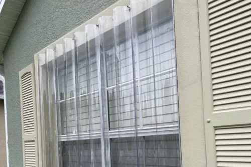Aluminum and clear Lexan storm panels installed by Affordable Glass Protection in Brevard County, Florida