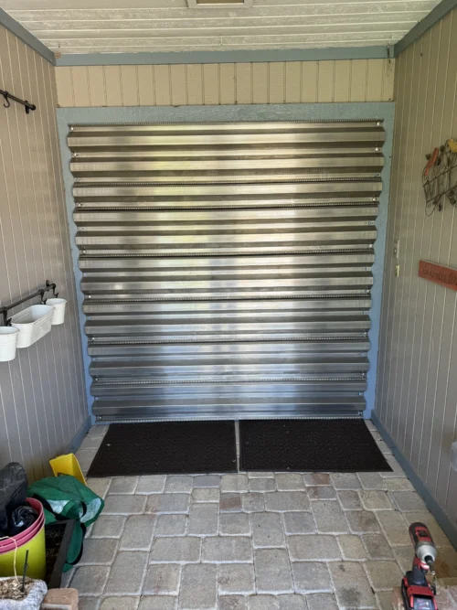 Aluminum and clear Lexan storm panels installed by Affordable Glass Protection in Brevard County, Florida