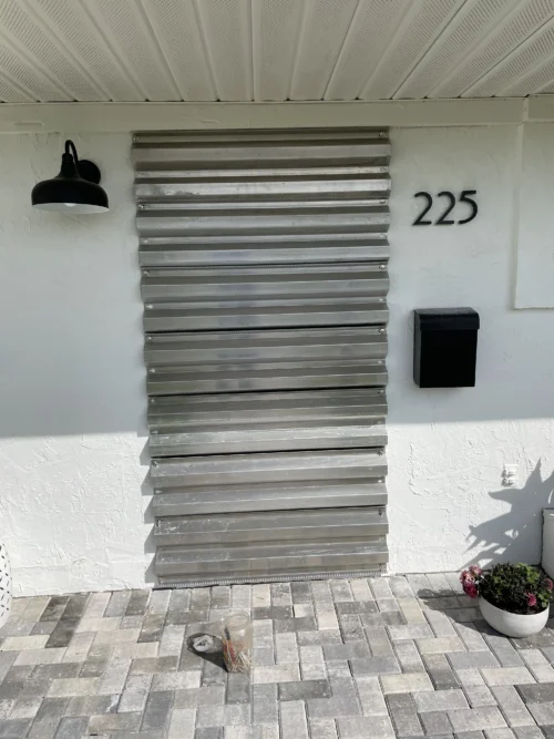 Aluminum and clear Lexan storm panels installed by Affordable Glass Protection in Brevard County, Florida