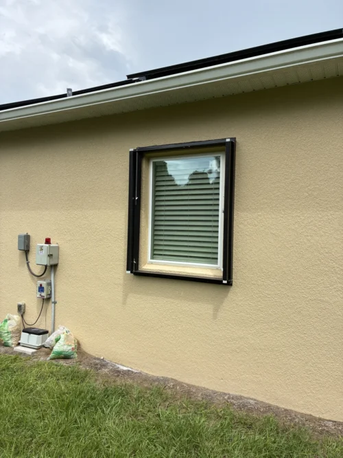 Accordion hurricane shutters installed by Affordable Glass Protection in Brevard County, Florida