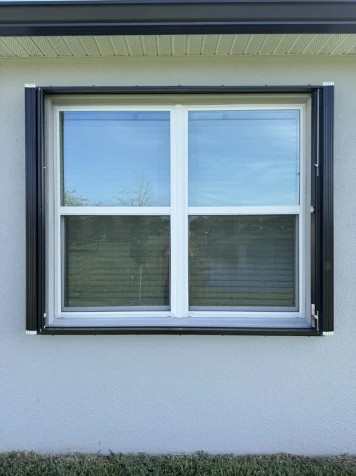 Accordion hurricane shutters installed by Affordable Glass Protection in Brevard County, Florida