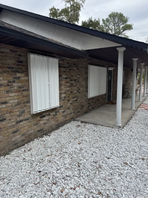 Accordion hurricane shutters installation on Florida's Space Coast by Affordable Glass Protection