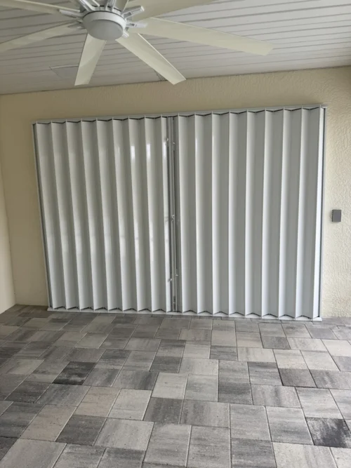 Accordion hurricane shutters installed by Affordable Glass Protection in Brevard County, Florida