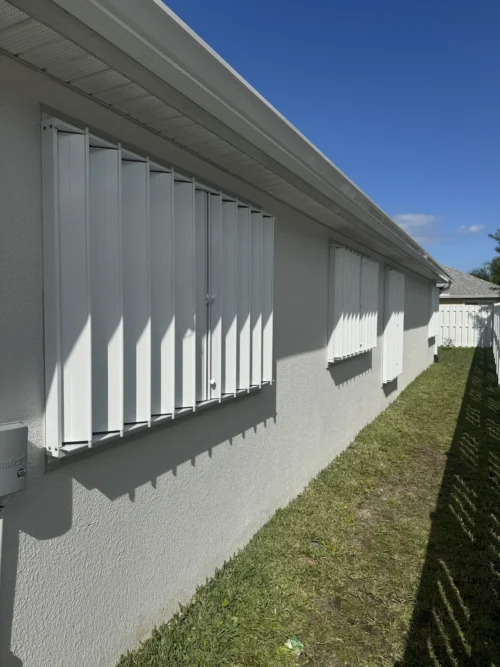 Accordion hurricane shutters installation on Florida's Space Coast by Affordable Glass Protection