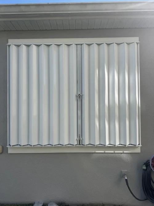 Accordion hurricane shutters installed by Affordable Glass Protection in Brevard County, Florida