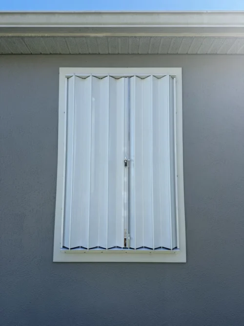 Accordion hurricane shutters installation on Florida's Space Coast by Affordable Glass Protection