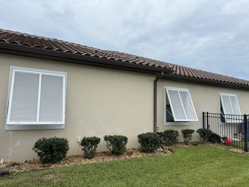 Bahama hurricane shutters installation on Florida's Space Coast by Affordable Glass Protection