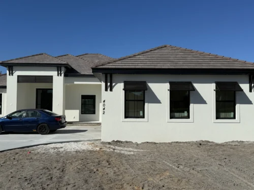 Bahama hurricane shutters installation on Florida's Space Coast by Affordable Glass Protection