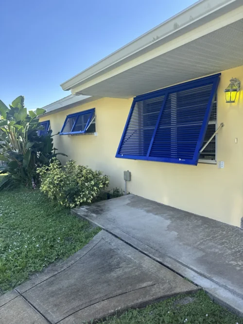 Bahama hurricane shutters fitted by Affordable Glass Protection on the Space Coast of Florida