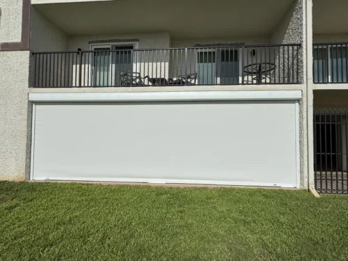 Roll-down metal hurricane shutters installation on Florida's Space Coast by Affordable Glass Protection