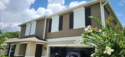 Roll-down metal hurricane shutters on a Brevard County, Florida home