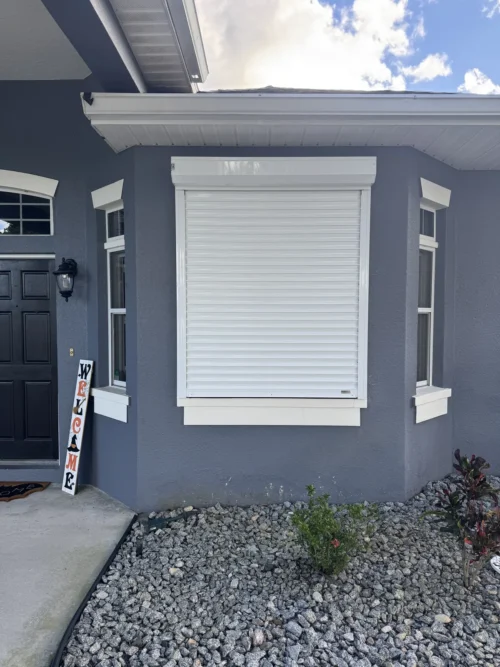 Roll-down metal hurricane shutters on a Brevard County, Florida home