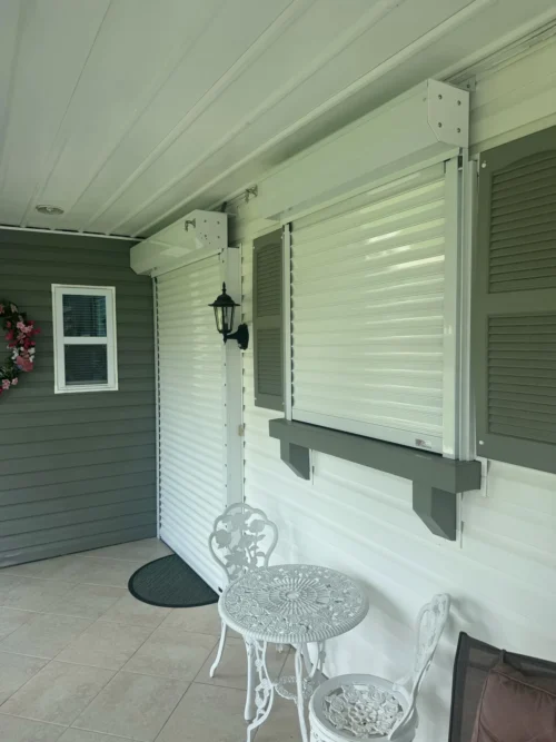 Roll Down Metal Shutters Front Porch — installed by Affordable Glass Protection